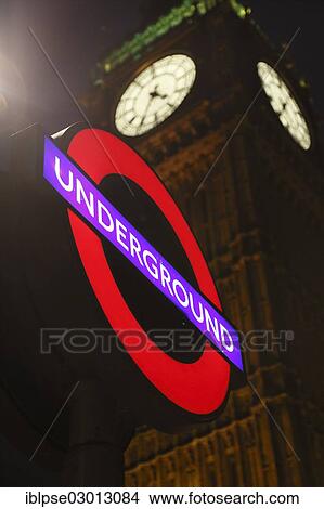 "Sign of Westminster Underground Station in front of Elizabeth Tower or Big Ben at night, City of Westminster, London, London region, England, United Kingdom, Europe" View Large Photo Image Picture - "Sign of Westminster Underground Station in front of Elizabeth Tower or Big Ben at night, City of Westminster, London, London region, England, United Kingdom, Europe". Fotosearch