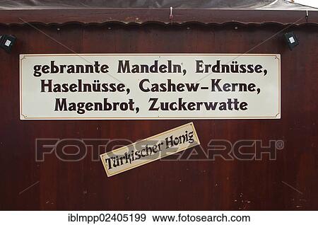 Stock Photo - "Sign on a booth for selling roasted almonds, Oktoberfest, Munich, Bavaria, Germany, Europe". Fotosearch