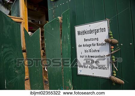 "Sign on the trailer which is used for playing and as a shelter in the forest kindergarten, Ilmmuenster, Bavaria, Germany, Europe" View Large Photo Image Stock Image - "Sign on the trailer which is used for playing and as a shelter in the forest kindergarten, Ilmmuenster, Bavaria, Germany, Europe". Fotosearch