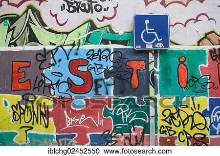 "Sign Parking for disabled and wall covered with graffiti, Catalonia, Spain, Europe" View Large Photo Image Stock Image - "Sign Parking for disabled and wall covered with graffiti, Catalonia, Spain, Europe". Fotosearch