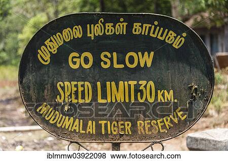 "Sign speed limit, """"Go slow"""" in Indian writing, Mudumalai Wildlife Sanctuary, Tamil Nadu, India, Asia" View Large Photo Image Stock Photo - "Sign speed limit, """"Go slow"""" in Indian writing, Mudumalai Wildlife Sanctuary, Tamil Nadu, India, Asia". Fotosearch