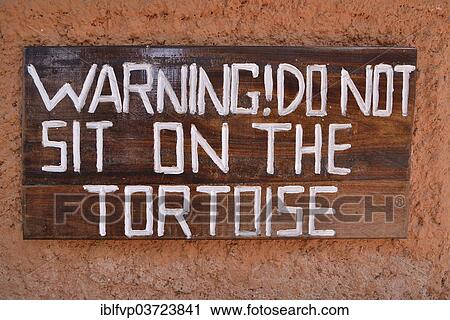 "Sign, """"Warning! Do not sit on the tortoise"""", Changuu Island, Zanzibar Archipelago, Tanzania, Africa" View Large Photo Image Stock Image - "Sign, """"Warning! Do not sit on the tortoise"""", Changuu Island, Zanzibar Archipelago, Tanzania, Africa". Fotosearch