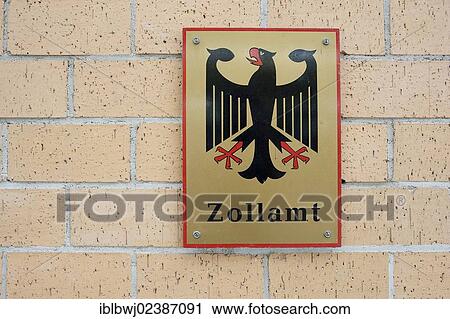 Stock Image - "Sign """"Zollamt"""", German for """"customs office"""", border crossing between Germany and Switzerland, Europe". Fotosearch