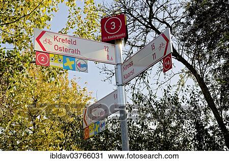 "Signpost on a cycle path, Meerbusch, North Rhine-Westphalia, Germany, Europe" View Large Photo Image Stock Image - "Signpost on a cycle path, Meerbusch, North Rhine-Westphalia, Germany, Europe". Fotosearch