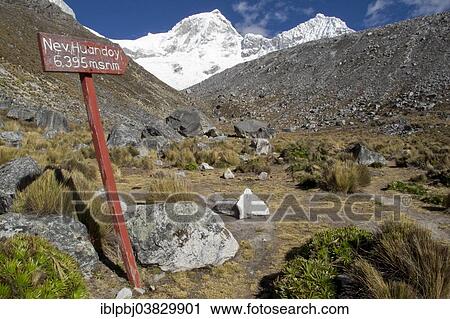 Stock Image - "Signpost to Mt Nevado Huandoy, Cordillera Blanca, Peru, South America". Fotosearch