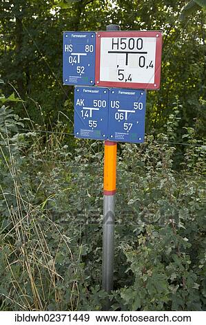 Stock Photo - "Signs indicating the location of water pipes, Dortmund, Ruhr area, North Rhine-Westphalia, Germany, Europe, PublicGround, Europe". Fotosearch