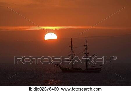 "Silhouette of a sailing boat against sunrise, near Port-Haliguen on the east side of the Quiberon peninsula, southern Brittany, Bretagne, France, Europe" View Large Photo Image Stock Image - "Silhouette of a sailing boat against sunrise, near Port-Haliguen on the east side of the Quiberon peninsula, southern Brittany, Bretagne, France, Europe". Fotosearch