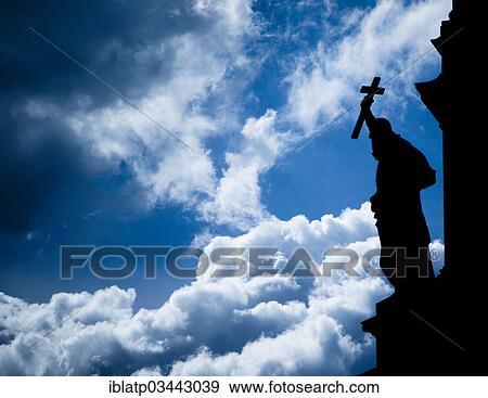 "Silhouette of a sculpture holding a cross, Berliner Dom, Berlin Cathedral, Museumsufer, Berlin, Berlin, Germany, Europe" View Large Photo Image Stock Photo - "Silhouette of a sculpture holding a cross, Berliner Dom, Berlin Cathedral, Museumsufer, Berlin, Berlin, Germany, Europe". Fotosearch