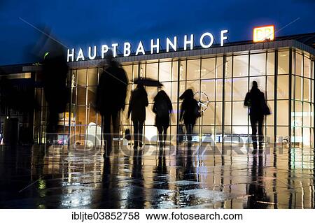 "Silhouettes of people at dusk in front of the Cologne Central Station or Hauptbahnhof, Cologne, North Rhine-Westphalia, Germany, Europe" View Large Photo Image Stock Photo - "Silhouettes of people at dusk in front of the Cologne Central Station or Hauptbahnhof, Cologne, North Rhine-Westphalia, Germany, Europe". Fotosearch