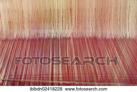 Stock Photo - Silk weaving, loom, Laos, Southeast Asia, Asia. Fotosearch