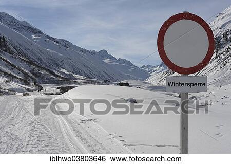 Stock Photograph - "Silvretta High Alpine Road in the snow, sign """"Wintersperre"""" or """"closed in winter"""", ski track to the Bielerhohe, Paznauntal, Galtur, Tirol, Austria, Europe". Fotosearch