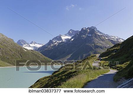 Stock Photo - "Silvretta reservoir, left Mt Piz Buin, right Mt Schattenspitze, Bielerhohe pass, Vermunt, Silvretta, Vorarlberg, Austria, Europe". Fotosearch
