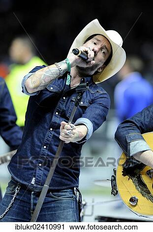 "Singer Boss Burns alias Alec Voelkel of the The BossHoss band, performing at the qualifying match for the FIFA World Cup 2014, Germany - Sweden 4: 4, Olympic Stadium, Berlin, Germany, Europe" View Large Photo Image Stock Image - "Singer Boss Burns alias Alec Voelkel of the The BossHoss band, performing at the qualifying match for the FIFA World Cup 2014, Germany - Sweden 4: 4, Olympic Stadium, Berlin, Germany, Europe". Fotosearch