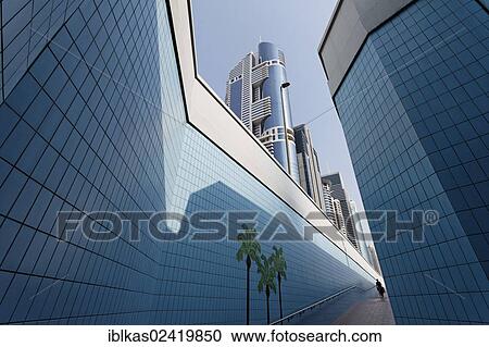 Single person walking through a pedestrian underpass with painted palm trees, Sheikh Zayed Road, Dubai, United Arab Emirates, Middle East, Asia View Large Photo Image Stock Image - Single person walking through a pedestrian underpass with painted palm trees, Sheikh Zayed Road, Dubai, United Arab Emirates, Middle East, Asia. Fotosearch