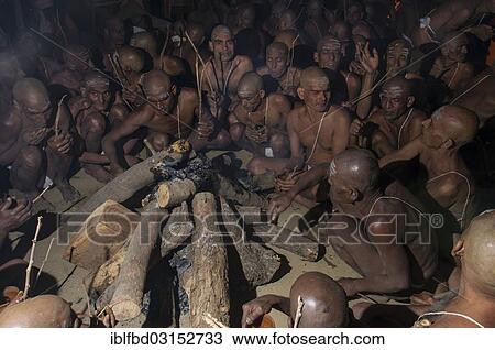 "Sitting around a bonfire and chanting mantras as part of the initiation of new sadhus, during Kumbha Mela festival, Allahabad, Uttar Pradesh, India, Asia" View Large Photo Image Stock Image - "Sitting around a bonfire and chanting mantras as part of the initiation of new sadhus, during Kumbha Mela festival, Allahabad, Uttar Pradesh, India, Asia". Fotosearch