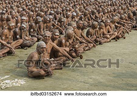 Picture - "Sitting in silence as part of the initiation of new sadhus, during Kumbha Mela festival, Allahabad, Uttar Pradesh, India, Asia". Fotosearch