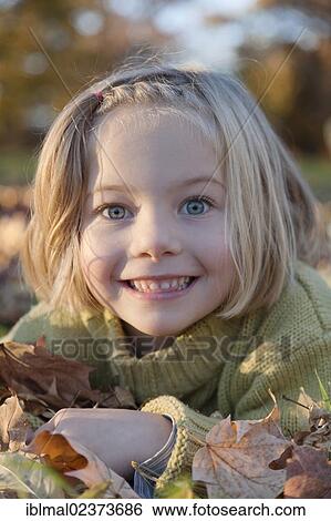 "Six-year-old girl in autumn, portrait" View Large Photo Image Stock Photograph - "Six-year-old girl in autumn, portrait". Fotosearch
