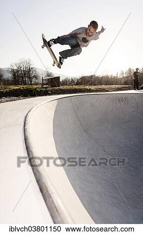 "Skateboarder skating in a skate pool, Worgl, North Tyrol, Austria, Europe" View Large Photo Image Stock Image - "Skateboarder skating in a skate pool, Worgl, North Tyrol, Austria, Europe". Fotosearch