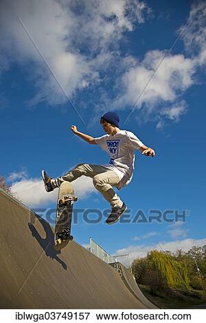 Stock Photo - "Skateboarder, twelve years, Lohse ramp, Cologne, Rhineland, North Rhine-Westphalia, Germany, Europe". Fotosearch