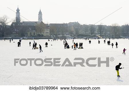 Picture - "Skaters on the frozen Lake Constance, Lindau, Bavaria, Germany, Europe". Fotosearch