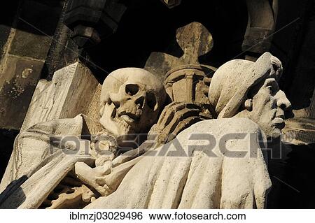 "Skeleton, death, behind St. James, Memento Mori motif at the entrance of the Market Church of Sts. George and James, Hannover, Lower Saxony, Germany, Europe" View Large Photo Image Stock Photograph - "Skeleton, death, behind St. James, Memento Mori motif at the entrance of the Market Church of Sts. George and James, Hannover, Lower Saxony, Germany, Europe". Fotosearch