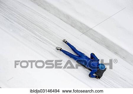 "Skeleton racer on the ice track, St Moritz, Engadin, Grisons, Switzerland, Europe" View Large Photo Image Picture - "Skeleton racer on the ice track, St Moritz, Engadin, Grisons, Switzerland, Europe". Fotosearch