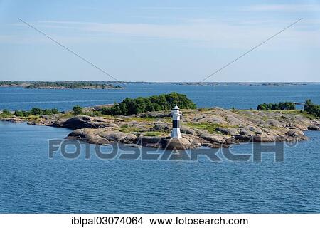 "Skerry with a lighthouse, Finland, Europe" View Large Photo Image Picture - "Skerry with a lighthouse, Finland, Europe". Fotosearch