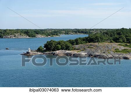 "Skerry with a lighthouse, Finland, Europe" View Large Photo Image Stock Image - "Skerry with a lighthouse, Finland, Europe". Fotosearch