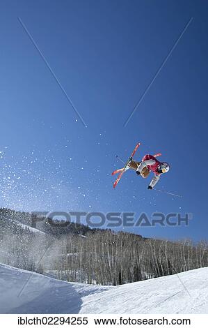 Stock Photography - "Ski acrobat in action, Aspen, Colorado, USA". Fotosearch