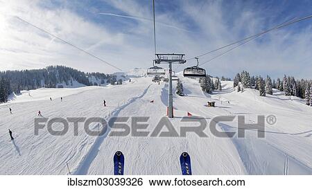 "Ski slopes, seen from the chairlift, Flumserberg, Flums, Canton of St. Gallen, Switzerland, Europe" View Large Photo Image Stock Photograph - "Ski slopes, seen from the chairlift, Flumserberg, Flums, Canton of St. Gallen, Switzerland, Europe". Fotosearch