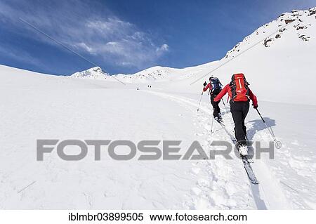 "Ski tourers climbing Stotz mountain, passing Lagauntal valley, near Kurzras in the Schnalstal valley, Saldurspitze mountain on the left, Schnals, Province of South Tyrol, Italy, Europe" View Large Photo Image Stock Photography - "Ski tourers climbing Stotz mountain, passing Lagauntal valley, near Kurzras in the Schnalstal valley, Saldurspitze mountain on the left, Schnals, Province of South Tyrol, Italy, Europe". Fotosearch