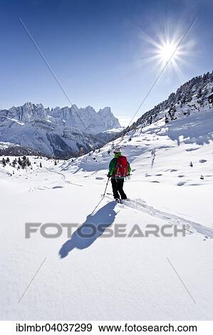 Stock Photo - "Ski touring, descent from Juribrutto above Passo Valles, Dolomites, behind the Palabelow the Passo Valles, Falcade, Trentino Province, Italy, Europe". Fotosearch
