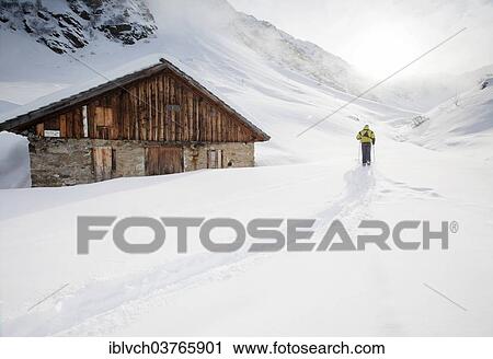 "Ski walker at a mountain hut, Malfontal, Pettneu am Arlberg, Tyrol, Austria, Europe" View Large Photo Image Stock Image - "Ski walker at a mountain hut, Malfontal, Pettneu am Arlberg, Tyrol, Austria, Europe". Fotosearch