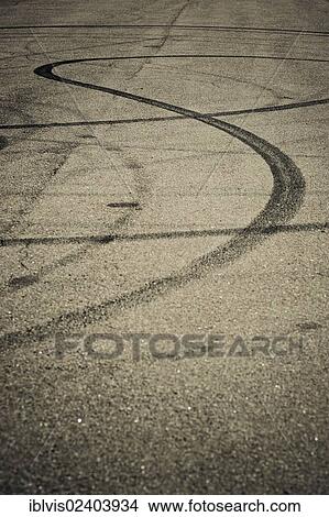Picture - Skidmarks on street. Fotosearch