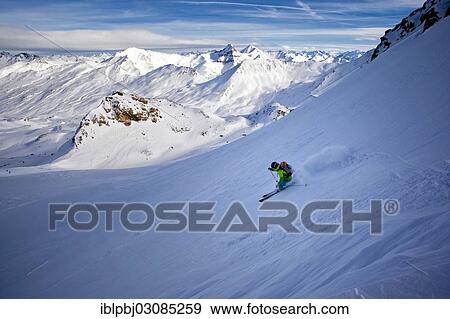 "Skier in powder snow, descending Zahnjoch Mountain, Ischgl, Silvretta, Tyrol, Austria, Europe" View Large Photo Image Stock Photo - "Skier in powder snow, descending Zahnjoch Mountain, Ischgl, Silvretta, Tyrol, Austria, Europe". Fotosearch