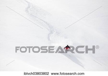 "Skier skiing in deep snow, Hochfugen Mountain, Zillertal, Tyrol, Austria, Europe" View Large Photo Image Stock Image - "Skier skiing in deep snow, Hochfugen Mountain, Zillertal, Tyrol, Austria, Europe". Fotosearch