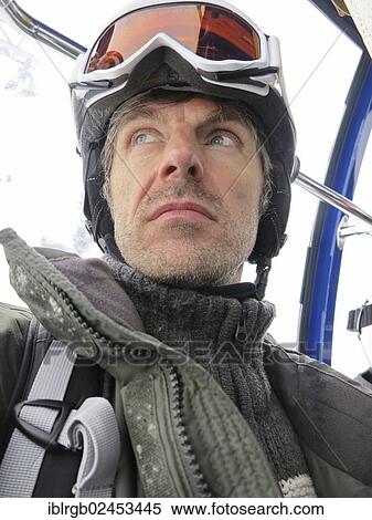"Skiers during a gondola ride in St. Anton am Arlberg, Tyrol, Austria, Europe" View Large Photo Image Stock Photography - "Skiers during a gondola ride in St. Anton am Arlberg, Tyrol, Austria, Europe". Fotosearch