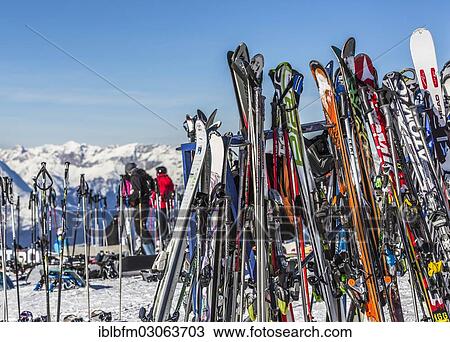 "Skis and snowboards leaning against ski racks, Skiregion Axamer Lizum, near Innsbruck, Innsbruck-Stadt District, North Tyrol, Tyrol, Austria, Europe" View Large Photo Image Stock Image - "Skis and snowboards leaning against ski racks, Skiregion Axamer Lizum, near Innsbruck, Innsbruck-Stadt District, North Tyrol, Tyrol, Austria, Europe". Fotosearch