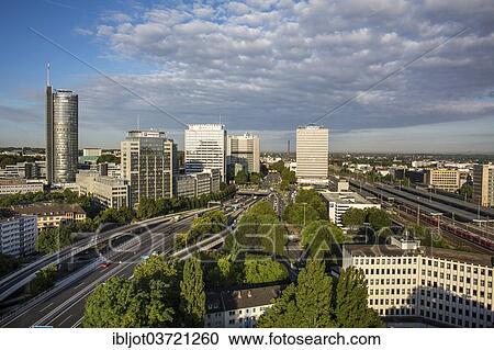 "Skyline along the A40 motorway or Ruhrschnellweg with RWE Tower, left, EVONIK Headquarters, Post Bank Building and Central Railway Station, Essen, North Rhine-Westphalia, Germany, Europe" View Large Photo Image Stock Image - "Skyline along the A40 motorway or Ruhrschnellweg with RWE Tower, left, EVONIK Headquarters, Post Bank Building and Central Railway Station, Essen, North Rhine-Westphalia, Germany, Europe". Fotosearch