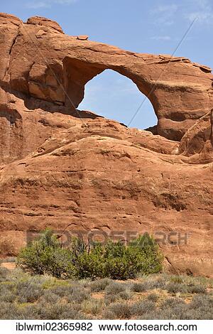 Stock Image - "Skyline Arch rock formation, Devil's Garden Section, Windows Section, Arches National Park, Moab, Utah, United States of America, USA". Fotosearch