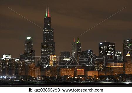 "Skyline at dusk, on the left the Willis Tower with Anti-Aids campaign, Chicago, Illinois, United States, North America" View Large Photo Image Stock Image - "Skyline at dusk, on the left the Willis Tower with Anti-Aids campaign, Chicago, Illinois, United States, North America". Fotosearch