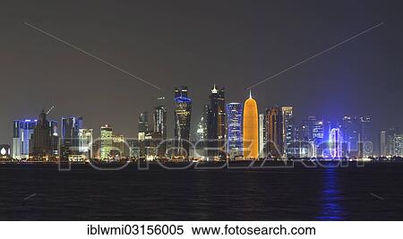 "Skyline of Doha at night with the Al Bidda Tower, Palm Tower 1 and 2, the World Trade Center, Tornado Tower, Burj Qatar Tower with golden illumination, Al Fardan Residences Tower and the Doha Bank Tower, Doha, Doha, Qatar, Asia" View Large Photo Image Stock Photography - "Skyline of Doha at night with the Al Bidda Tower, Palm Tower 1 and 2, the World Trade Center, Tornado Tower, Burj Qatar Tower with golden illumination, Al Fardan Residences Tower and the Doha Bank Tower, Doha, Doha, Qatar, Asia". Fotosearch