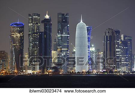 Picture - "Skyline of Doha with Al Bidda Tower, Palm Tower 1 and 2, World Trade Center, Burj Qatar Tower with silver illumination, Tornado Tower, night scene, Doha Corniche, Doha, Doha, Qatar, Asia". Fotosearch
