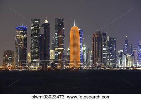 "Skyline of Doha with Al Bidda Tower, Palm Tower 1 and 2, World Trade Center, Burj Qatar Tower with golden illumination, Tornado Tower, night scene, Doha Corniche, Doha, Doha, Qatar, Asia" View Large Photo Image Stock Image - "Skyline of Doha with Al Bidda Tower, Palm Tower 1 and 2, World Trade Center, Burj Qatar Tower with golden illumination, Tornado Tower, night scene, Doha Corniche, Doha, Doha, Qatar, Asia". Fotosearch