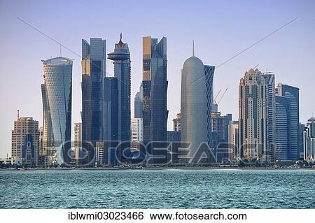 "Skyline of Doha with Al Bidda Tower, Palm Tower 1 and 2, World Trade Center, Burj Qatar Tower, Tornado Tower, Doha Corniche, Doha, Doha, Qatar, Asia" View Large Photo Image Stock Photograph - "Skyline of Doha with Al Bidda Tower, Palm Tower 1 and 2, World Trade Center, Burj Qatar Tower, Tornado Tower, Doha Corniche, Doha, Doha, Qatar, Asia". Fotosearch