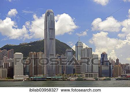 Stock Photo - "Skyline of Hong Kong Island and Hong Kong River, with Bank of China left and IFC 2 Tower right, Kowloon, Hong Kong, China, Asia". Fotosearch