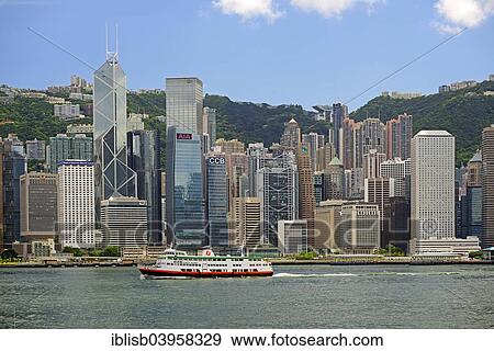 Stock Photo - "Skyline of Hong Kong Island and Hong Kong River, with Bank of China left, Kowloon, Hong Kong, China, Asia". Fotosearch