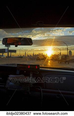 "Skyline of Manhattan at sunset, from a taxi, New York, USA" View Large Photo Image Stock Photo - "Skyline of Manhattan at sunset, from a taxi, New York, USA". Fotosearch