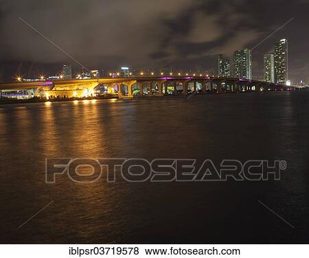Stock Photo - "Skyline of Miami at night, Miami Beach, Miami-Dade County, Florida, United States, North America". Fotosearch