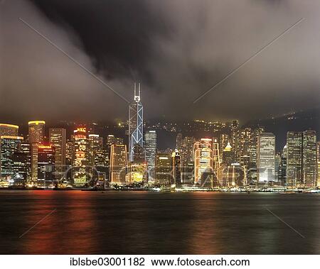 Stock Image - "Skyline of Victoria Island, Bank of China Tower, view from Kowloon, night scene, Central District, Hong Kong, Hong Kong Island, Hong kong, China, People's Republic of China, Asia". Fotosearch